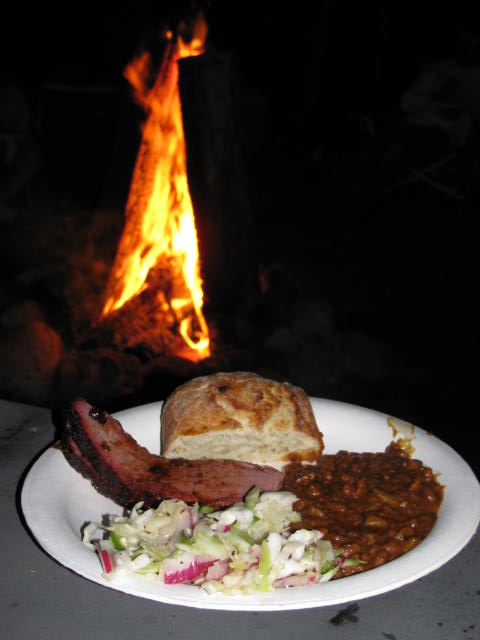 BBQ beans in front of a roaring fire.